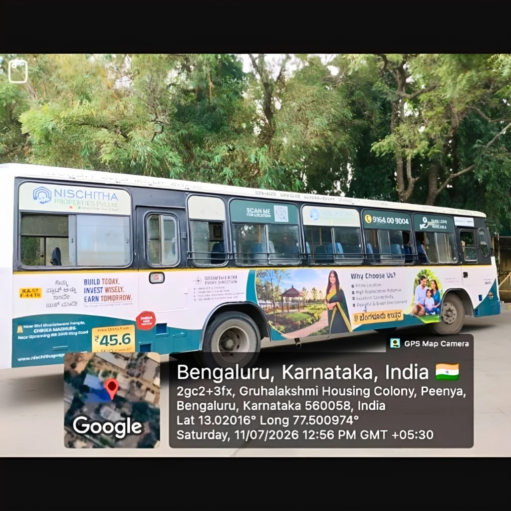 BMTC Bus advertisement for Nischitha Properties Driver Side
