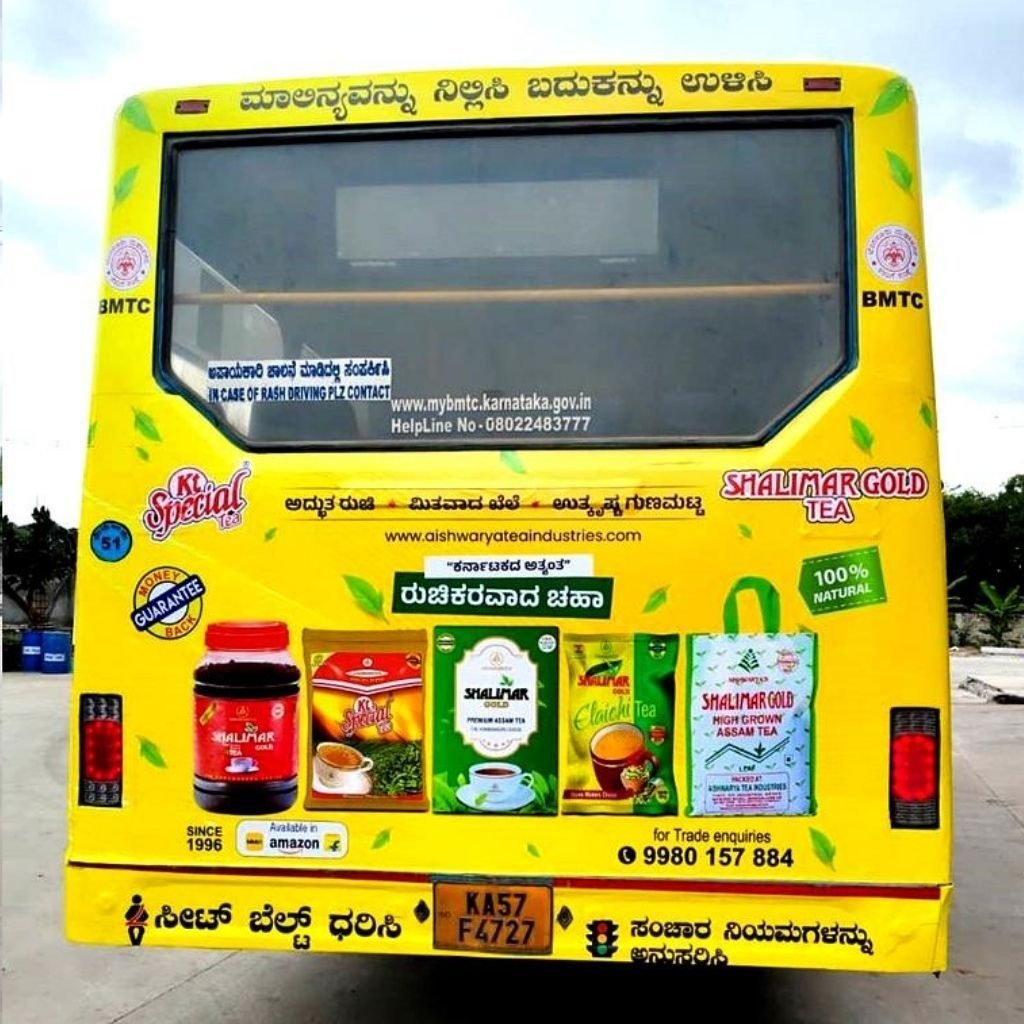 BMTC bus back panel advertisement for Aishwarya Tea Industries